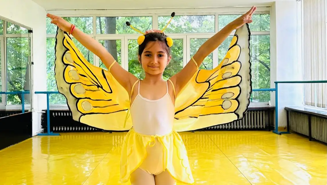 Sophie, 11-year-old girl who loves ballet, portrait before treatment